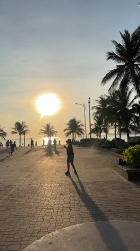 Evening sunset activity captured on Nha Trang seaside walkway