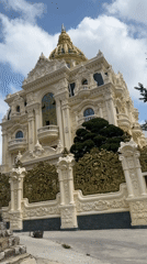 Golden-domed mansion draws attention on busy Da Lat street