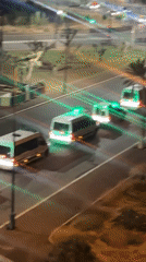Convoy of lit vans observed traveling through Marrakesh at night