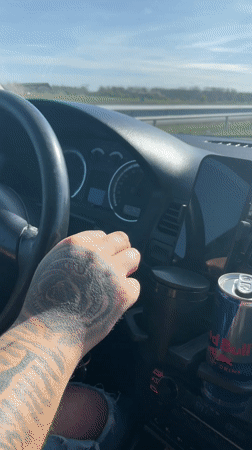 Driver travels Dutch highway near Almere under clear skies