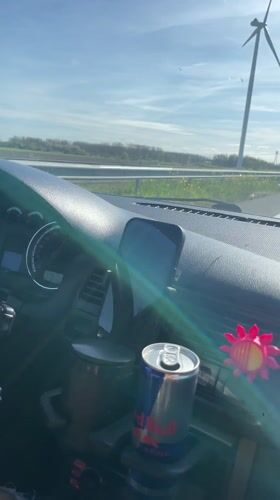 Driver travels Dutch highway near Almere under clear skies