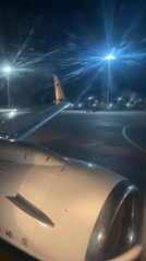 Passenger documents nighttime departure preparations at Ufa Airport