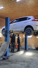 Car repairs and street drives on a morning in Asbest