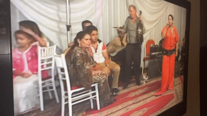 Wedding celebration with belly dancer televised in Saâda, Morocco