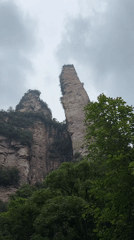 Tourist activity amid towering sandstone pillars documented in Luoguta