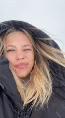 Woman navigates snowstorm, visits salon in Reutov, Russia