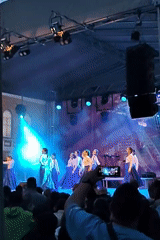 Dance groups perform synchronized routine on stage in Shumen