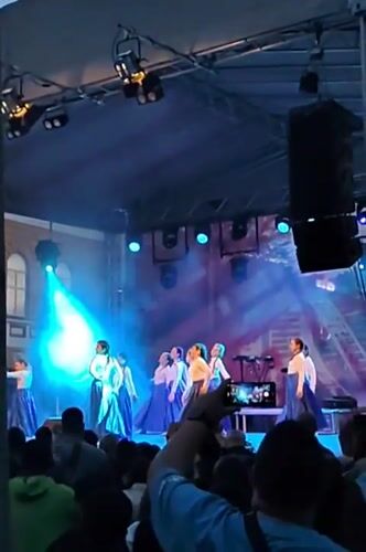 Dance groups perform synchronized routine on stage in Shumen