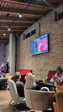 Evening drinks at a cozy Warsaw bar with exposed brick