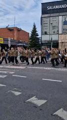 Brass band parade draws crowds in early morning gathering