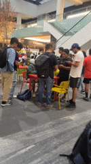 Evening crowds gather at Puebla shopping center, Coppel store