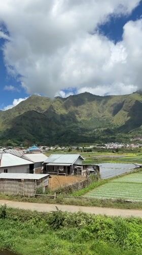 Rural Indonesian village life documented amid mountains and pollution