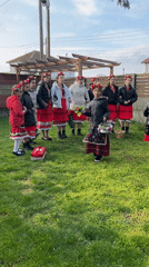 Young dancers in traditional costumes gather in Bulgarian village
