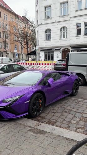 Purple Lamborghini spotted on Berlin cobblestone street