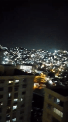 Caracas residents document nighttime city views and indoor moments