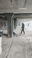 Cleanup crews work in fire-damaged Fryazino industrial building