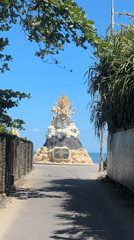 Morning beach scenes and statue sightings documented in North Kuta
