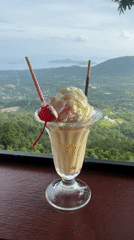 Hilltop café overlooking Ko Samui's green hills and sea