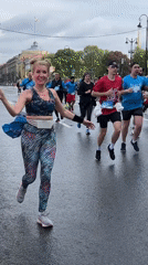 Marathon runners race through wet Saint Petersburg streets