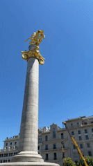 Golden equestrian monument documented in Tbilisi under clear skies