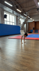 Early morning gymnastics training session captured in Chaikovsky gym