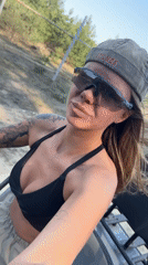 Woman rides ATV on dirt trails near Nizhny Novgorod