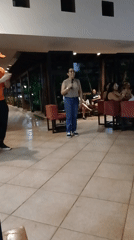 Impromptu singing performances captured in Venezuela hotel lobby
