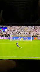 Soccer penalty shootout captured on smartphone screen, 6-5 score