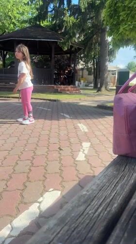 Girl enjoys afternoon park activities in Resen, Bulgaria