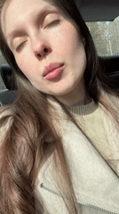 Woman filmed as passenger in vehicle in Moscow
