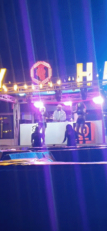 Outdoor nightclub event with DJ and dancers in northern Nigeria