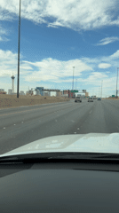 Dashcam captures highway drive through Las Vegas with skyline view