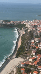 Aerial view of Anglet's turquoise coastline and urban sprawl
