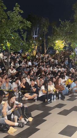 Bangkok night crowd gathers near Amari hotel