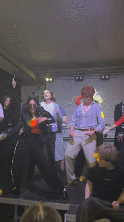 Teenagers perform dance routine at indoor party in Minsk