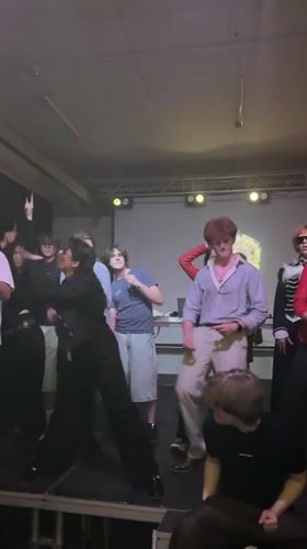 Teenagers perform dance routine at indoor party in Minsk