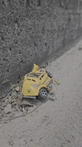 Damaged toy car found near wrecked Honda in Thailand