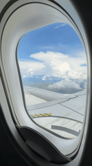 Passenger films airplane wing with arrow markings over Tbilisi