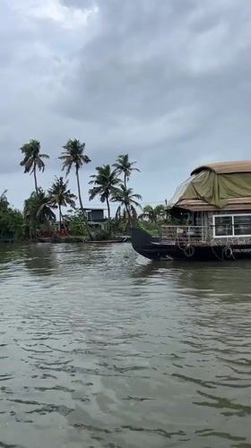 Houseboat spotted moored along waterway in Kadavu, India