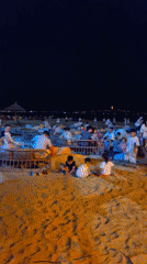 Nighttime beach party at Camino Beach Club, Da Nang