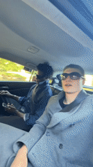 Two young men observed in car backseat in London