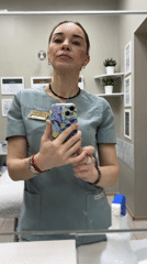 Healthcare worker Anna takes selfies at medical facility