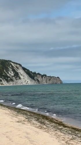 Coastal scenes captured at Byala Bulgaria beach under overcast conditions
