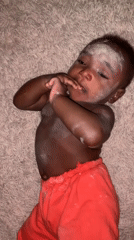 Baby with white powder observed on rug in Nigeria