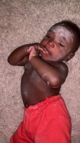 Baby with white powder observed on rug in Nigeria