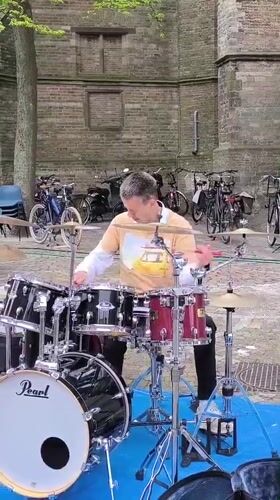 Street festival with music, food vendors, rides in Alkmaar