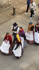 Traditional Basque folk group walks through Santiago de Compostela square