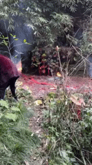 Woman documents firecracker ceremony with selfies in rural Chongqing
