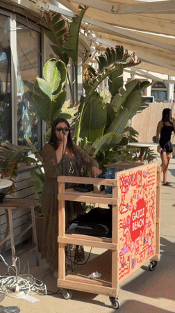 Afternoon beach gathering with music performance observed in Tel Aviv