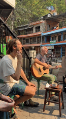 Musicians gather for casual morning session at Pokhara cafe